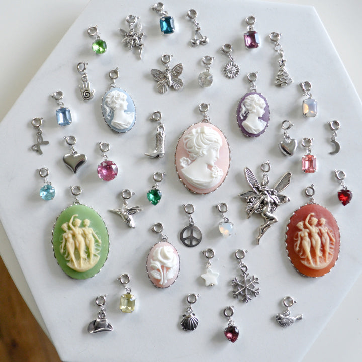 Tiny Hand Charm • Silver Halfable