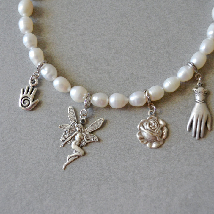 Tiny Hand Charm • Silver Halfable