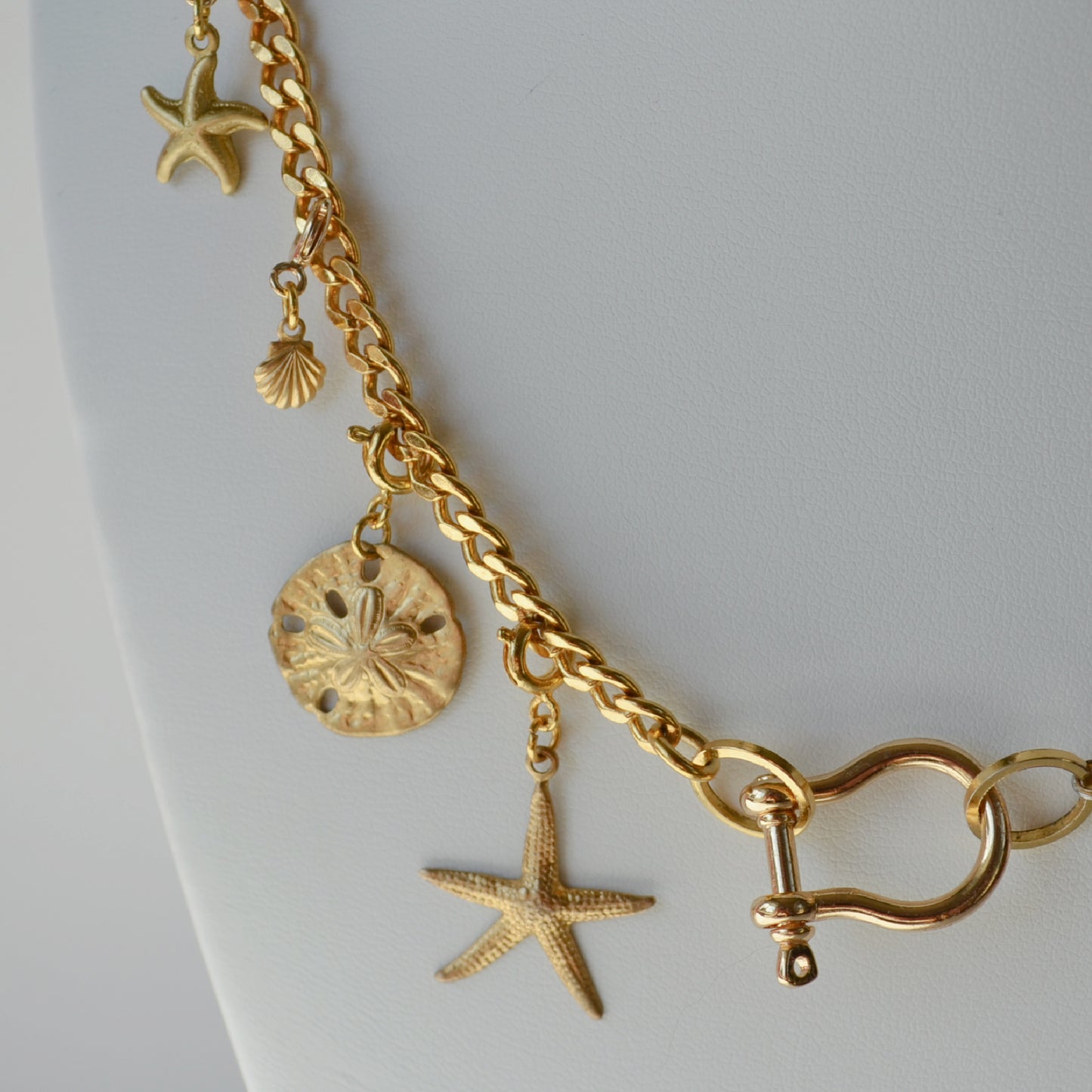 Tiny Shell Charm • Halfable