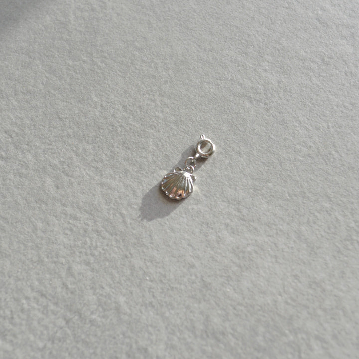 Tiny Shell Charm • Silver Halfable