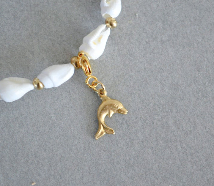 Dolphin Charm • Halfable